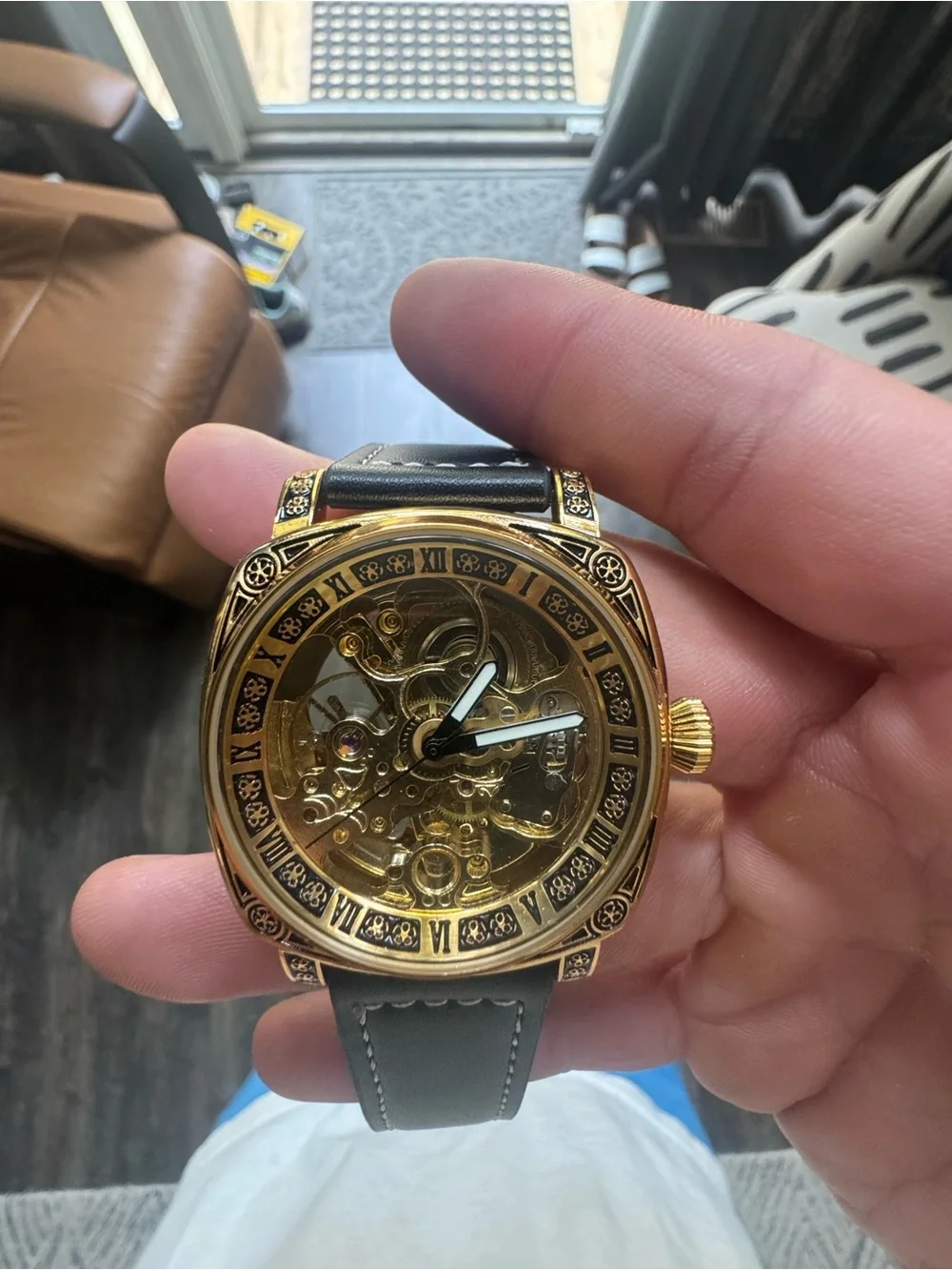 Gold Skeleton Mechanical Watch with Black Leather Strap